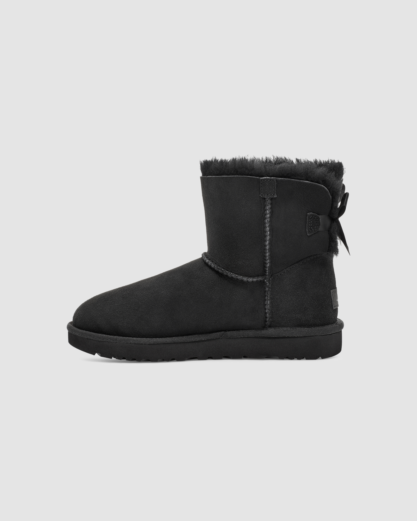 Black ugg boots with bows on back best sale